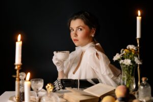 a woman with prosthetic hand while drinking tea